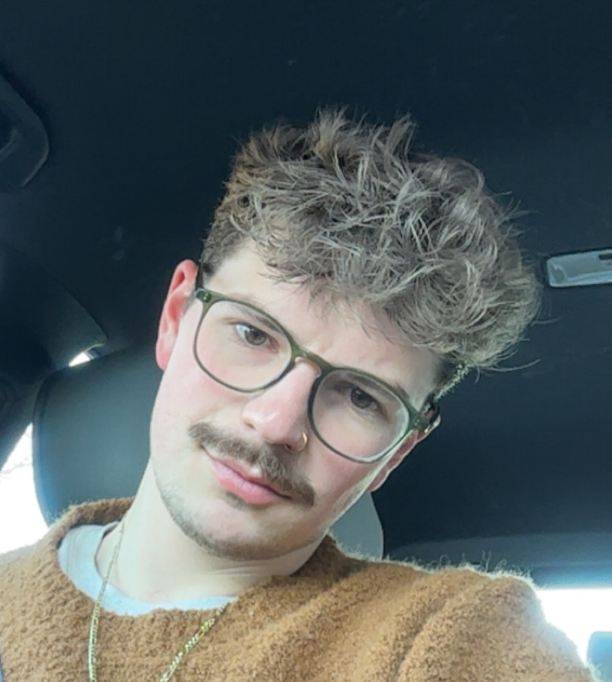 Coach Carson Beguelin